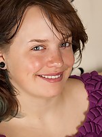 Natural Celia unwraps her curvy body and big bouncing breasts before sitting down and spreading her thick soft thighs to show off her bush.